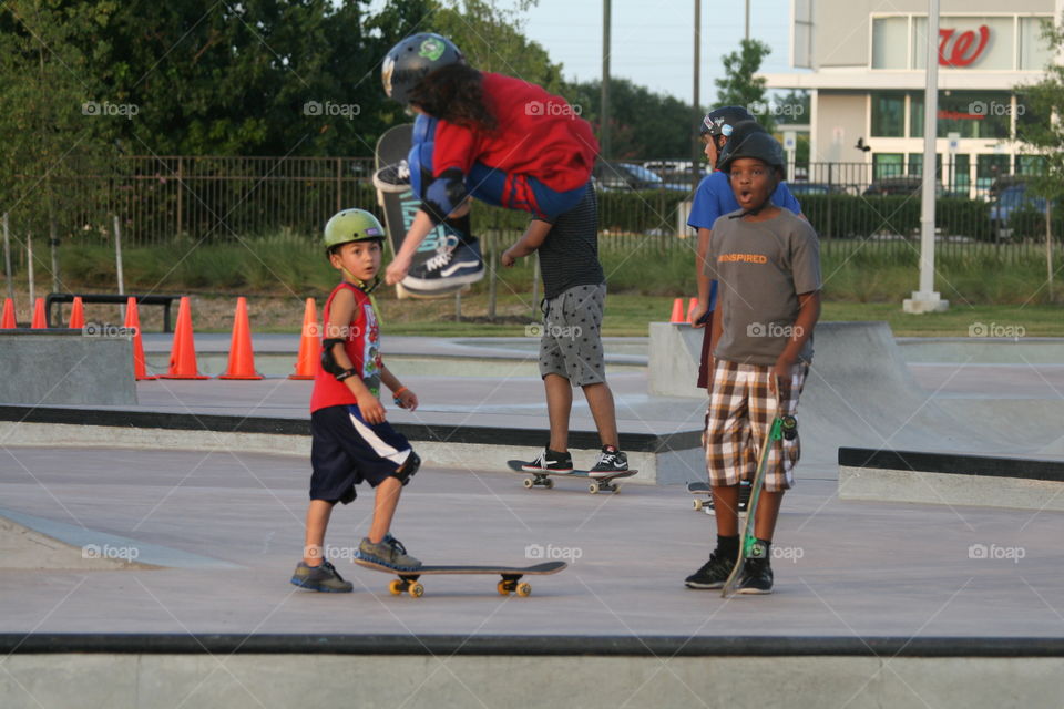 Jordan catching some huge air out if the bowl at the Spring Skatepark in Texas. love the kids expression on the right as he wishes he could do what this girl does.