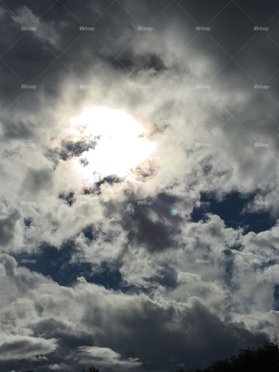 sun peeking through the clouds 