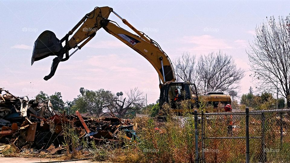 Demolition - Sad - Tearing down an old elementary school for new housing.