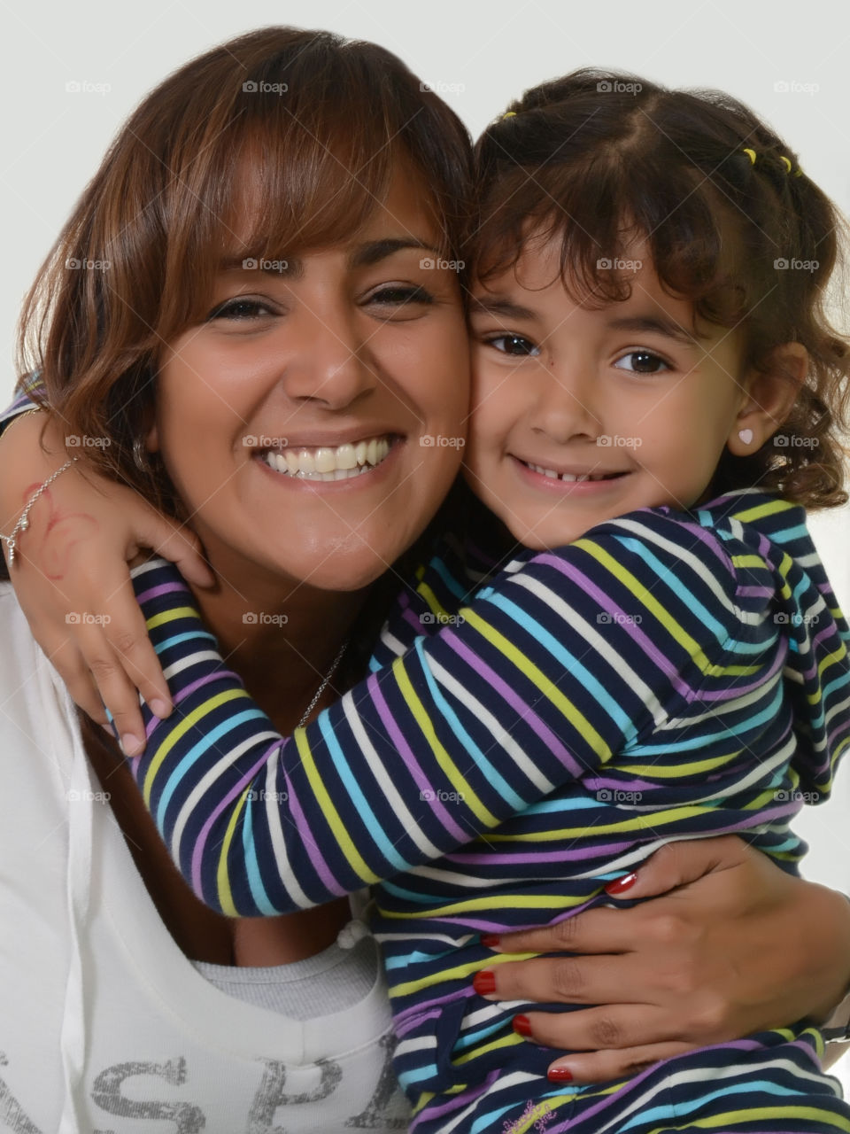 Close-up of mother and daughter