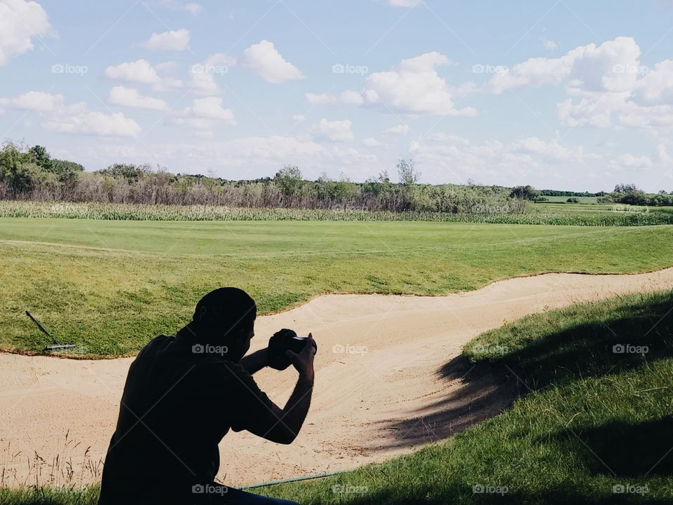 Guy taking a photo