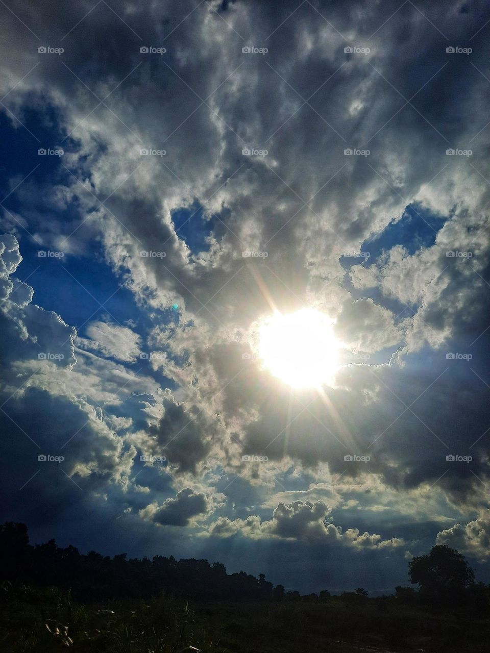 Sun, clouds, dark clouds, blue sky, nature, evening, sunny.