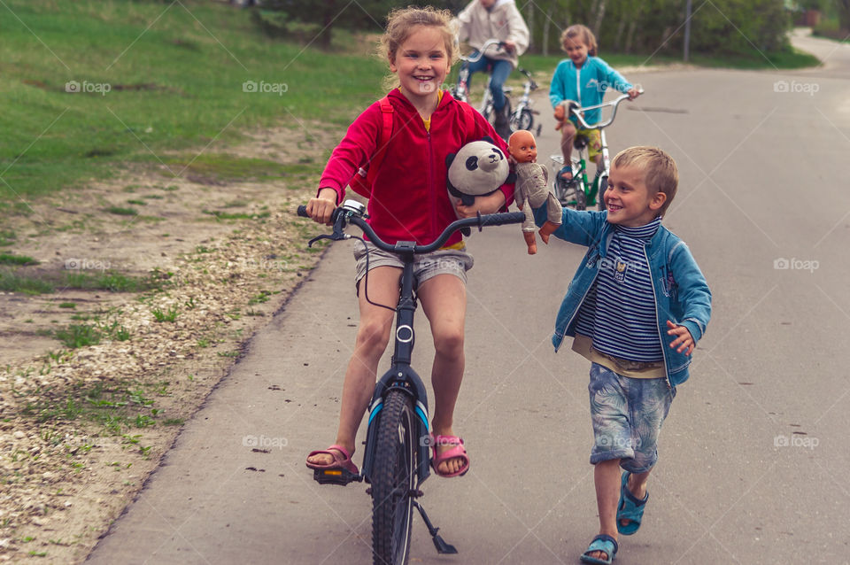 Kids playing with each other on the countryside