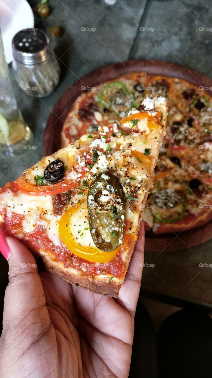 Pizza toppings| Thin crust Pizza| Italian Pizza|
Jalapeño| tomato | olives | oregano | Delicious pizza|
I can have pizza  anyday anytime.
Pizza is true love, 
Made with perfection and four cheese this pizza tasted absolutely delicious.