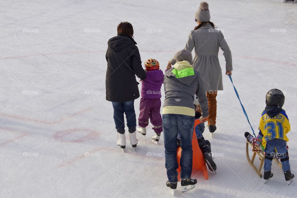 Family on ice rink