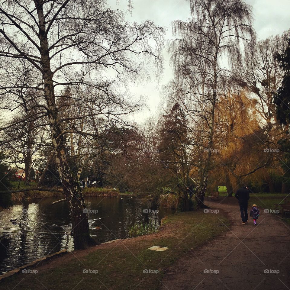 Autumn walking in the park, Father and Daughter