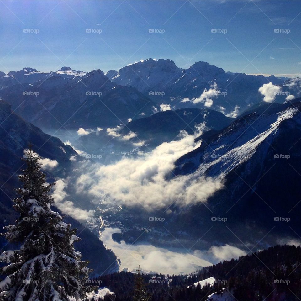 Skiing in the Alps. View over Alleghe-Dolomites