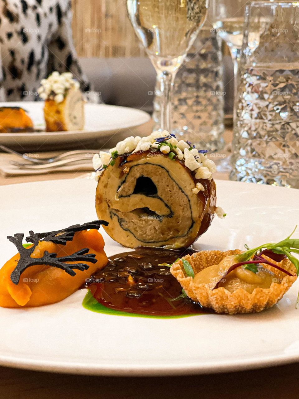 Chicken roll with fuagra and carrot creme