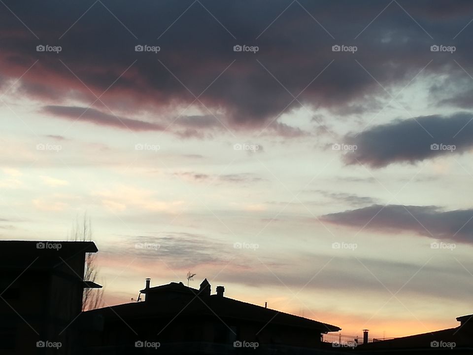 Roofs under the sky at a: a beautiful profile