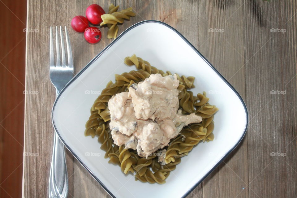 Vegetable pasta on wooden table