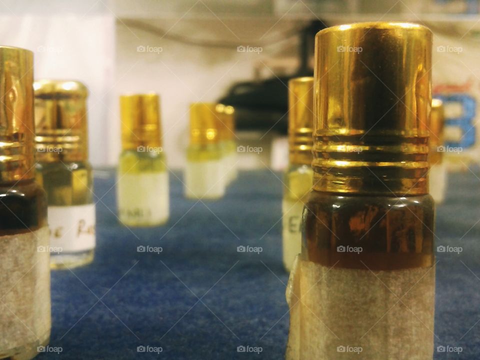 Golden Bottles of perfume.