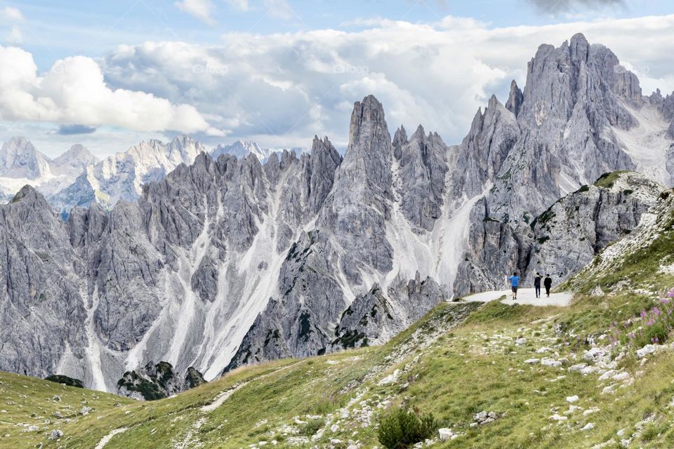 Hiking in the beautiful Dolomites Italy at summer, dramatic and unique mountain peaks 