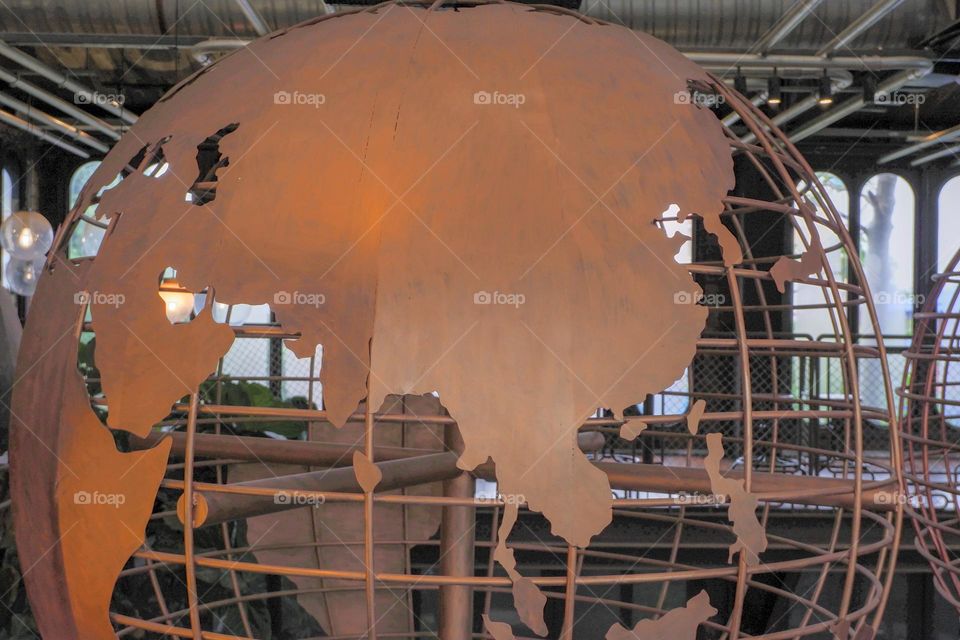 artifacts of the world Made of brown painted steel. Light bulb. Background. Glass. Vintage style window. suitable for background