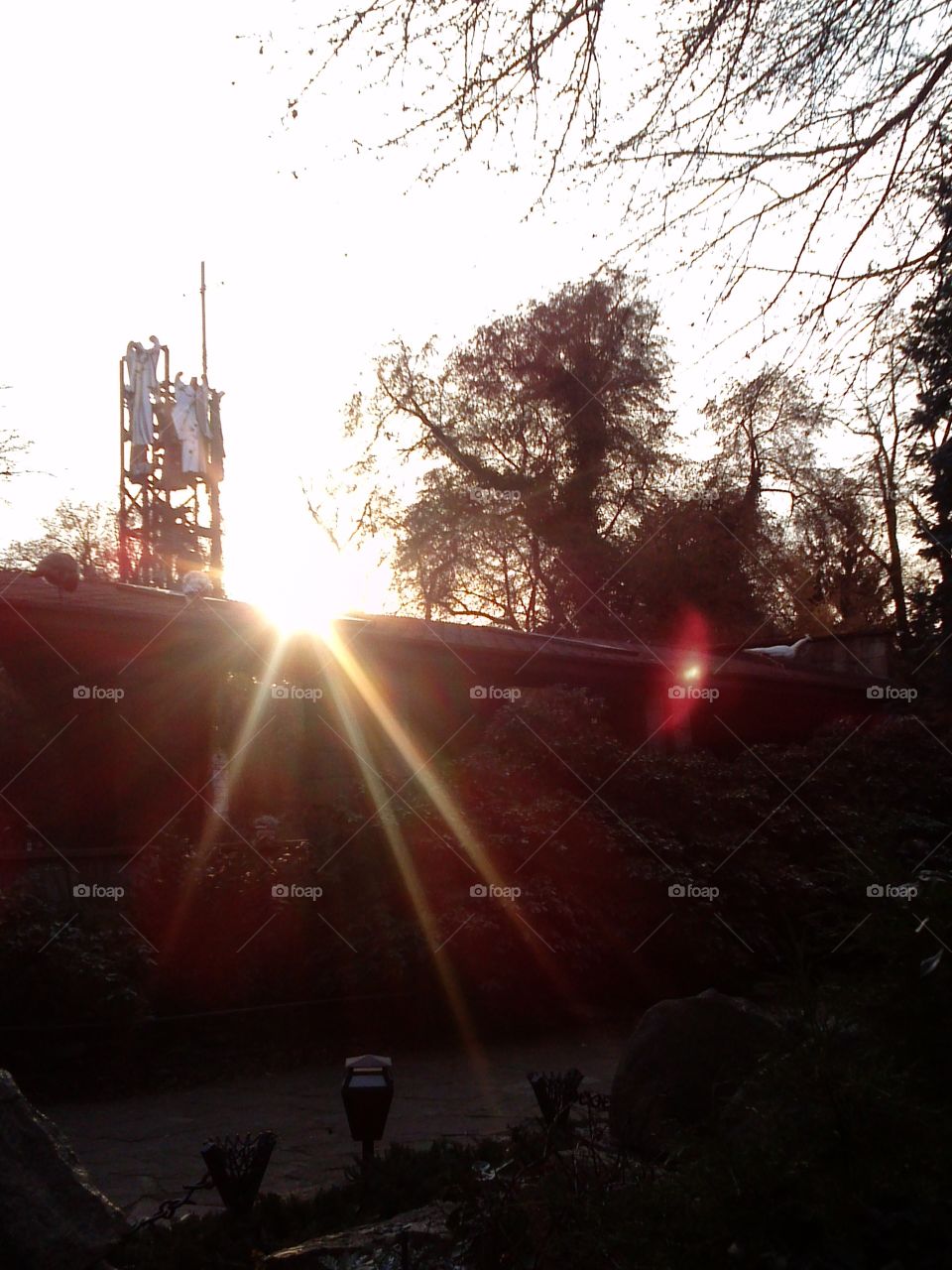 belfry, angels and sun