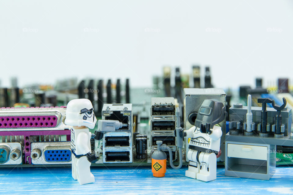 Nonthabure, Thailand - August, 02, 2016: Lego star wars repairing computer motherboard.The lego Star Wars mini figures from movie series.Lego is an interlocking brick system collected around the world.