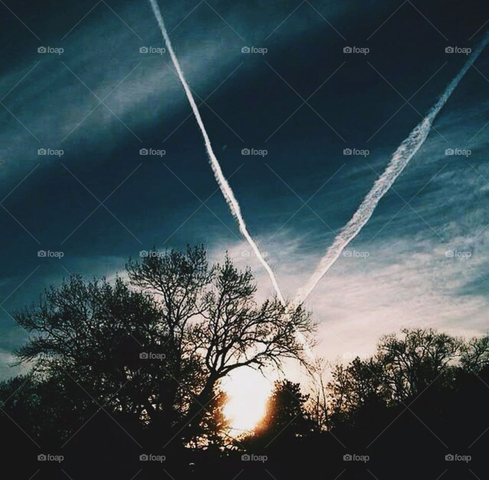 sunsets and contrails