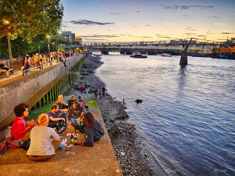 Picnic along River Thames with Millenium Bridge in background