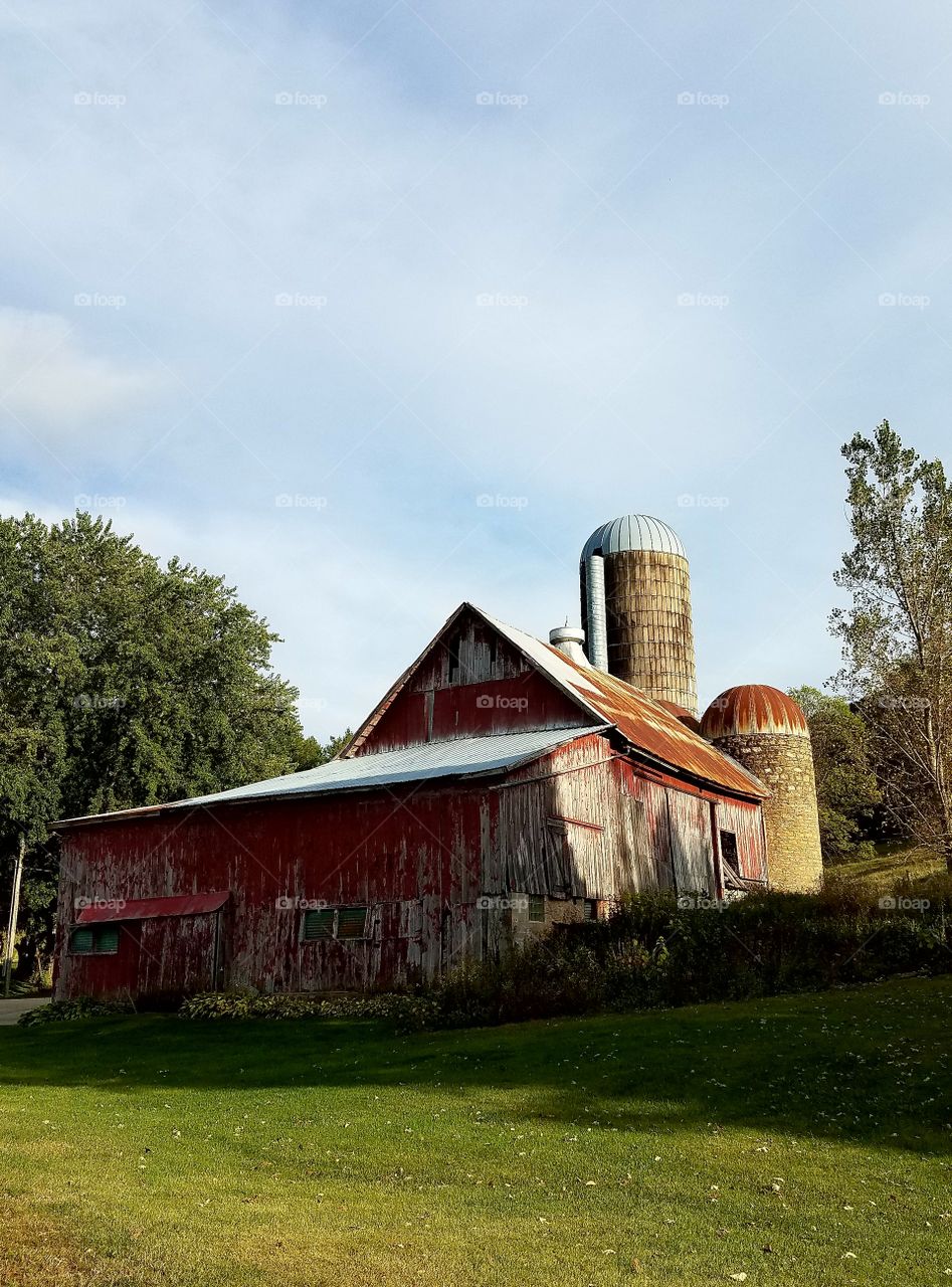 Driving the Back Roads and enjoying everything around us. Rustic barn and silo.