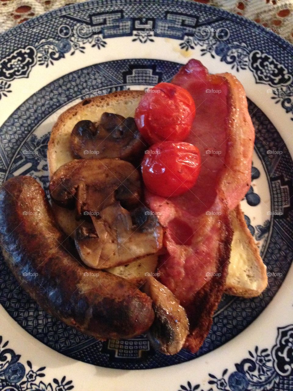 English breakfast bacon mushrooms tomatoes and toast