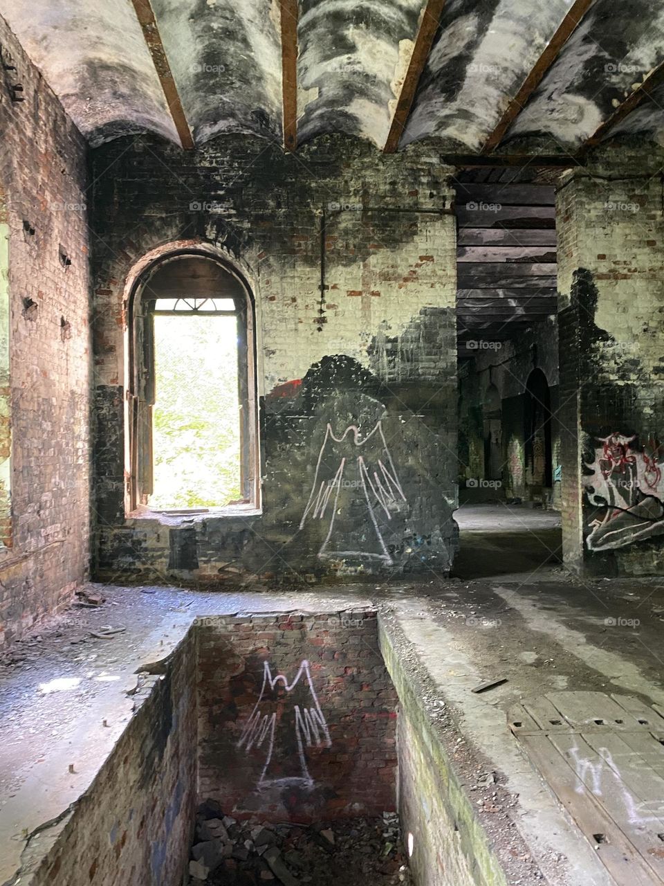 Old building with graffiti inside 