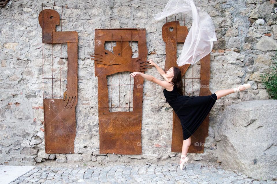 Young Female Ballerina Dancing with a Scarf Outside