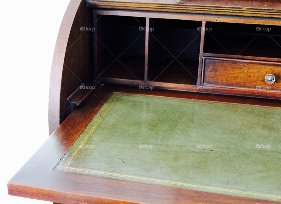 Green Color Story - green leather writing surface on a dark wooden roll-top desk