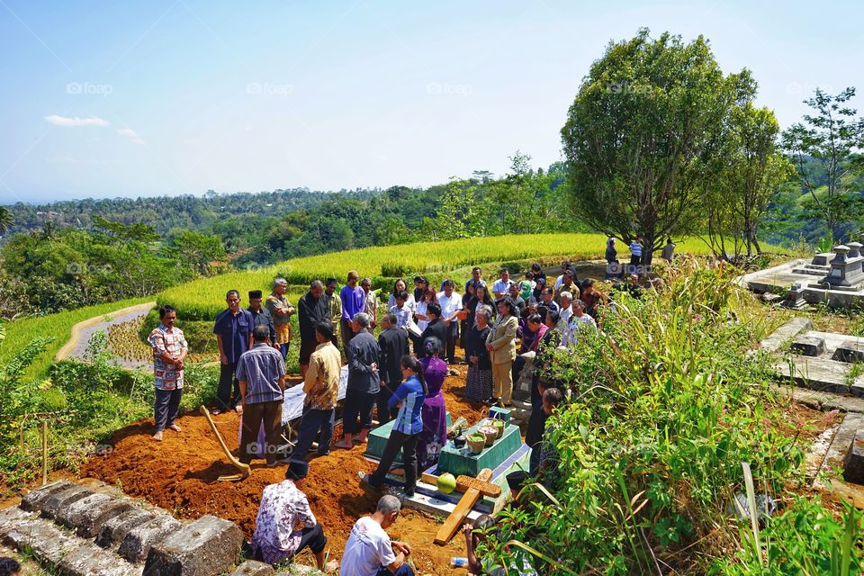 christian funeral procession in a javanese village of Indonesia