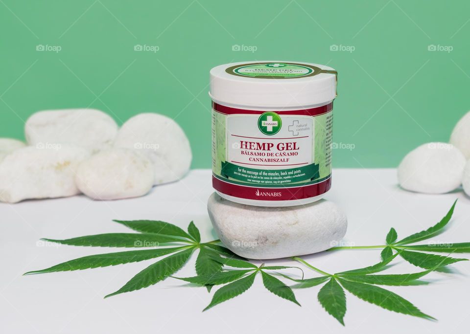 Annabis Hemp Gel displayed with cannabis leaves in a green and white setting