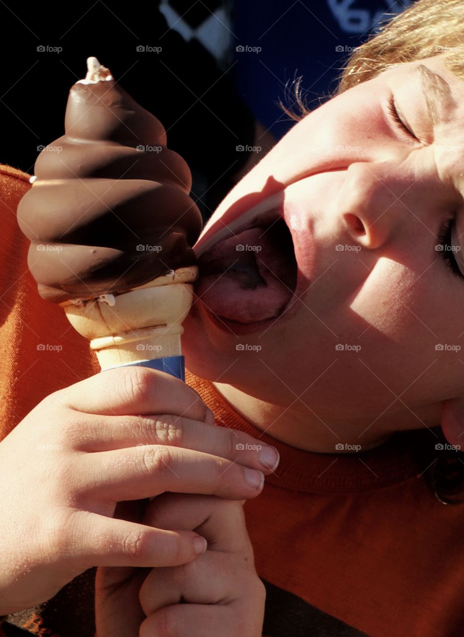 Boy Eating An Ice Cream Cone
