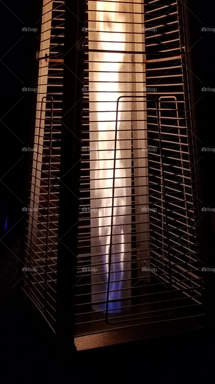heat lamp keeping us comfy outside at the Beach House Bar & Grill, Pompano Beach, Florida