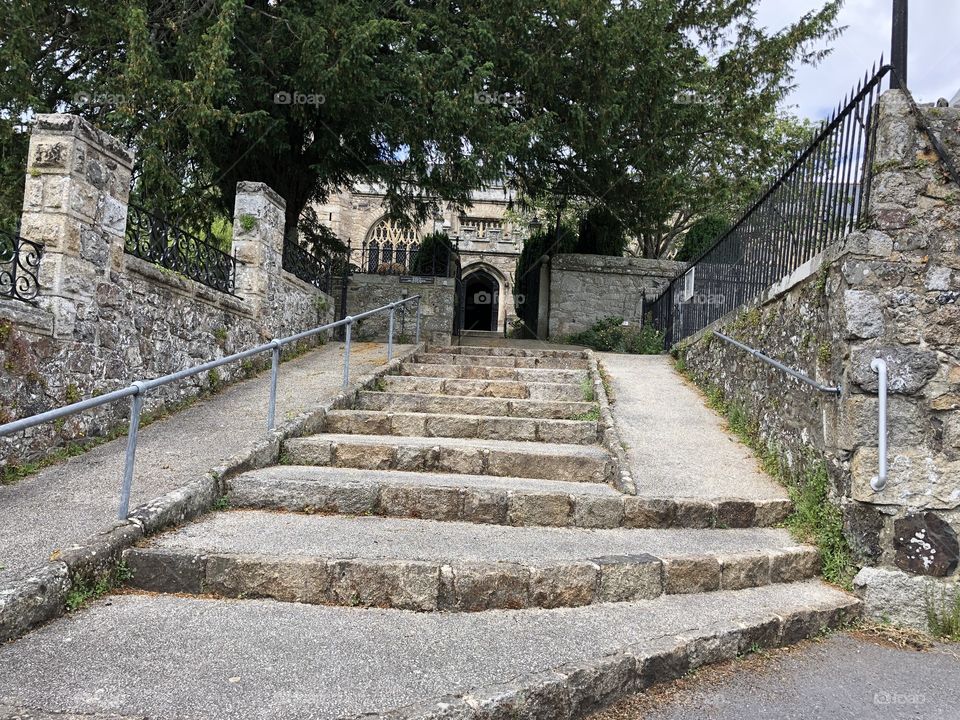 Some formidable steps leading to the parish church for Bovey Tracey in Devon, UK