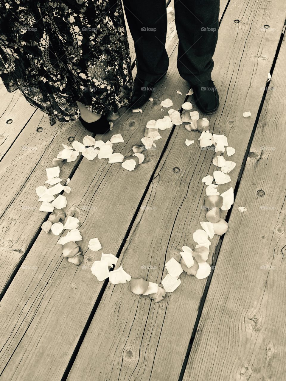 First steps as Husband and Wife through this beautiful heart made of rose petals. My new sister in law was pregnant at the time in this simple autumnal ceremony at the end of the boardwalk