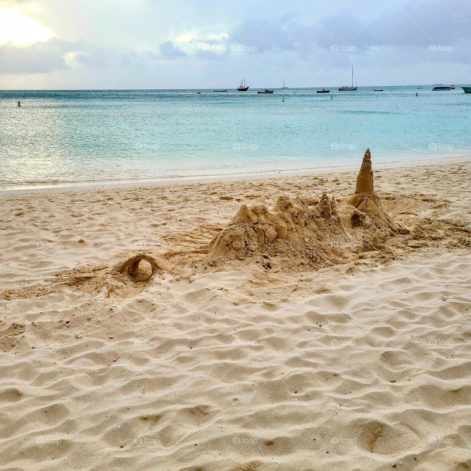 Walking long walks at the beach in Aruba.