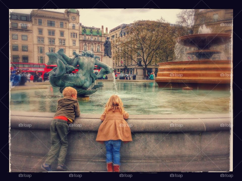 Trafalgar Square, London . Watching the fountains at Trafalgar Square