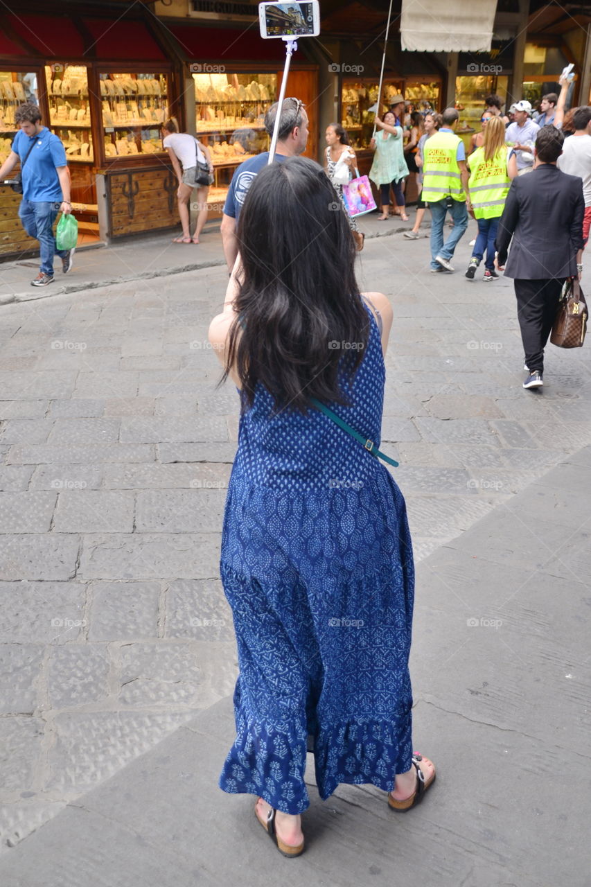 a tourist woman gets a selfie