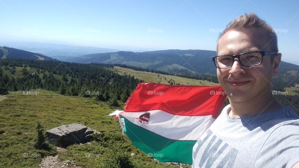 Hungarian flag in Madarasi Hargita mountain. In Transylvania.