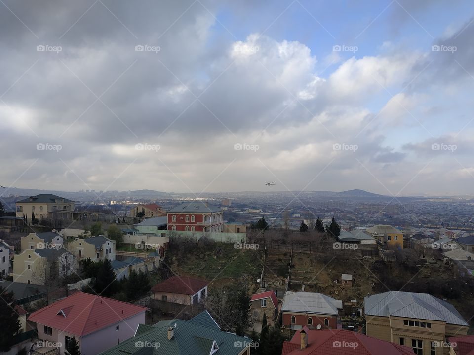 find helicopter on the clouds