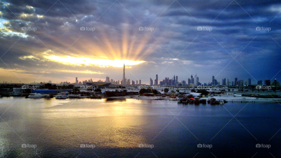 light sunset clouds water by obnasr