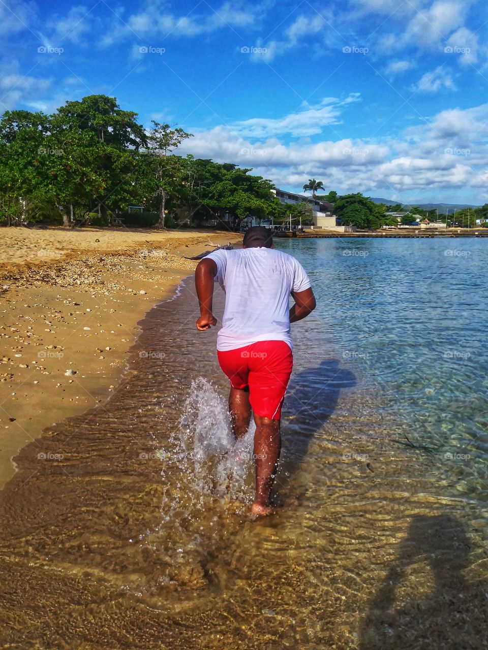 man running at the beach