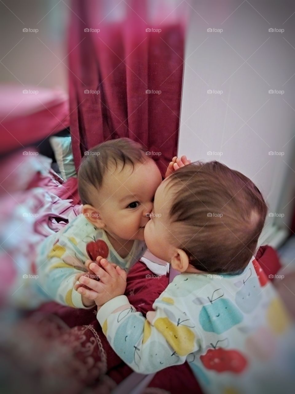 my brother son playing with mirror