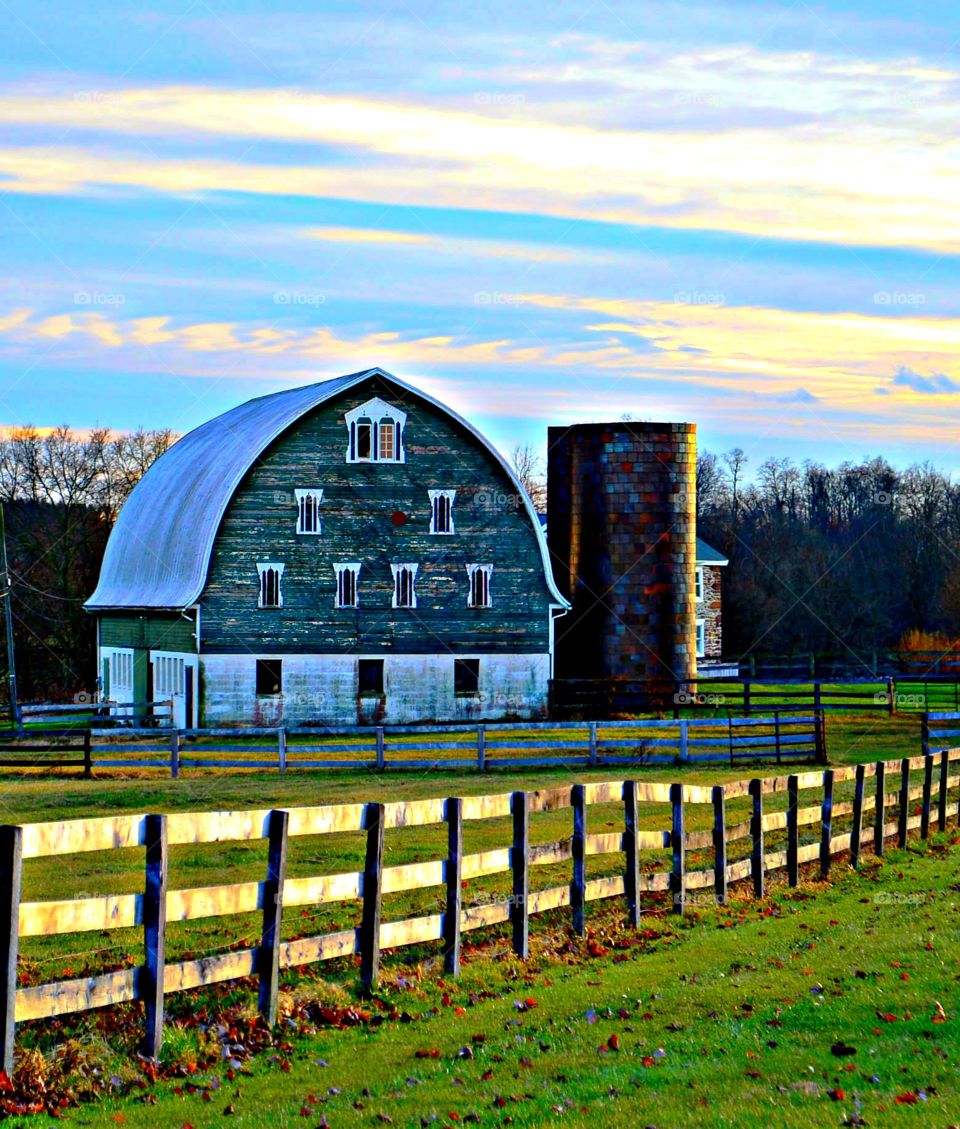country barn. colorful old barn and silo