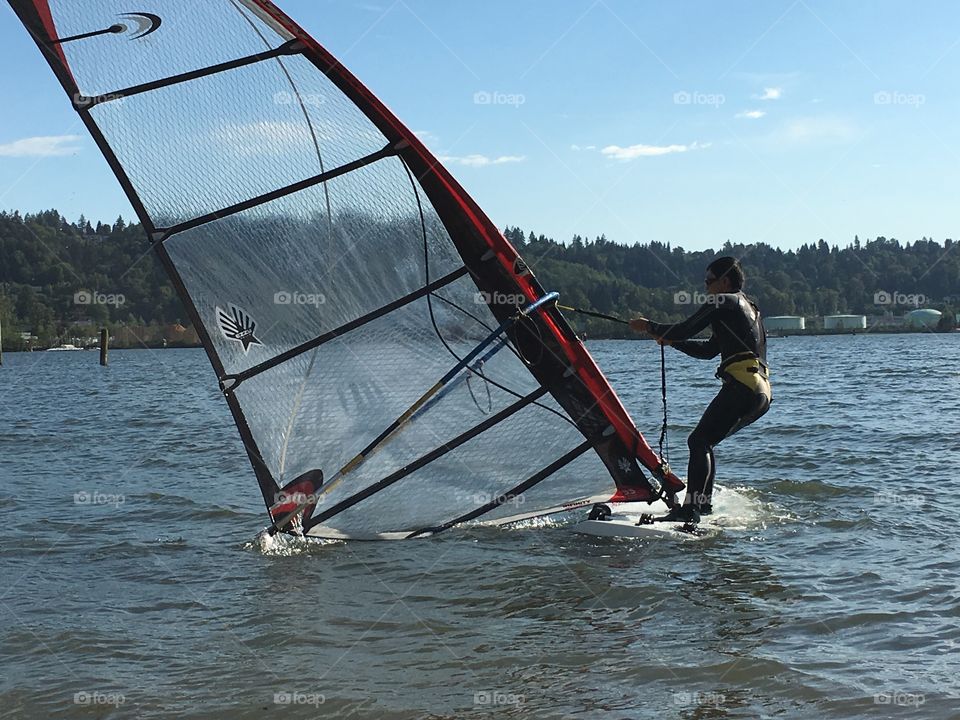 Man windsurfing in harbour near Vancouver 