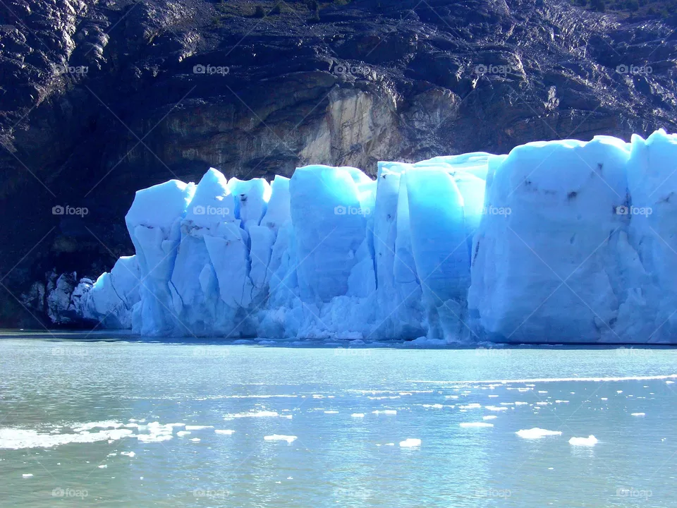 The Gray glacier is a glacier located in Chile, in the western part of Torres del Paine National Park, in the Chilean Patagonia that is part of the Southern Ice Fields. It is a mass of ice 6 kilometers wide and more than 30 meters high divided into two fronts. In 1996 it had a total area of ​​270 km² and a length of 28 kilometers