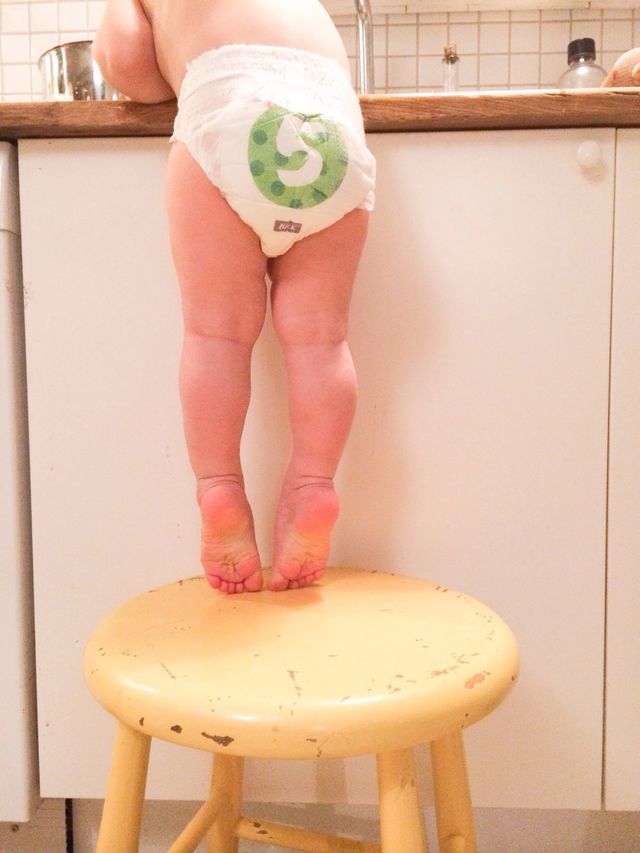 Baby stretching on toes