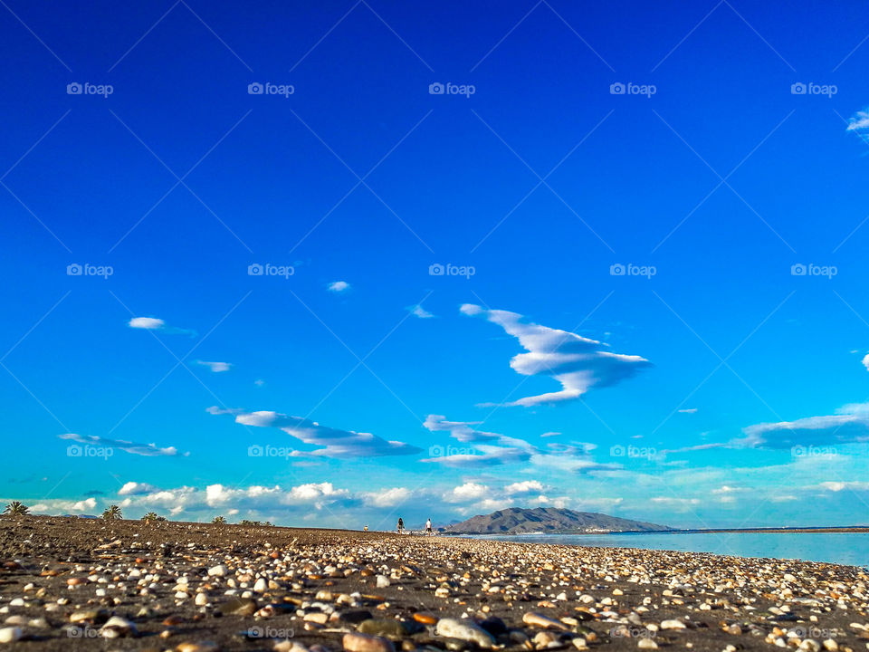 Low perspective of pebble Beach in Spain.