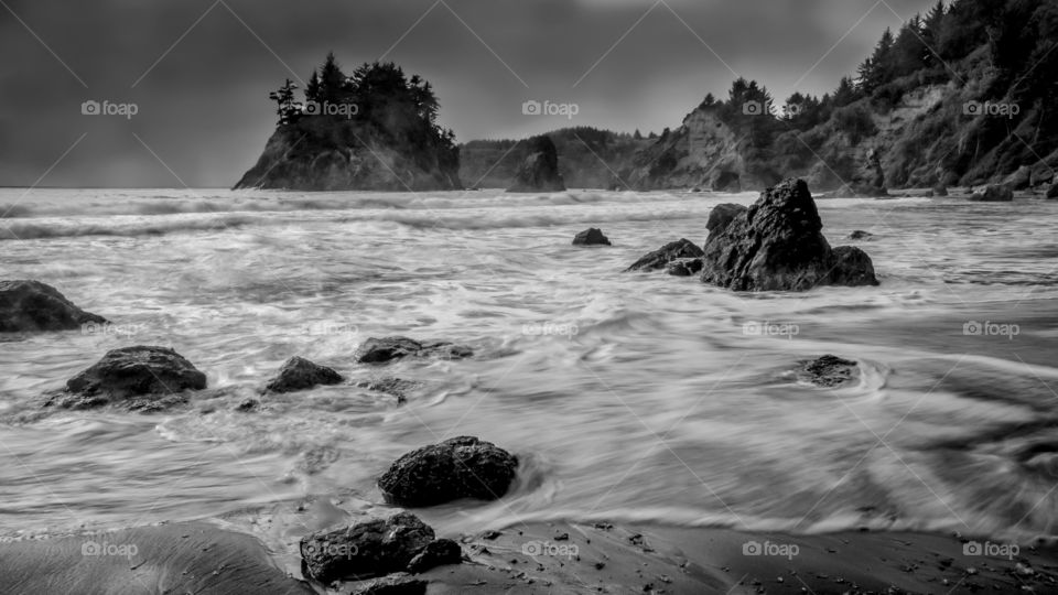 Surf at rocky beach