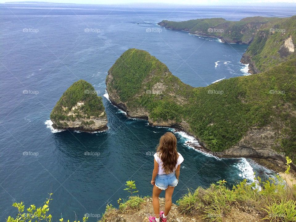 Young woman meditating and enjoying the view 