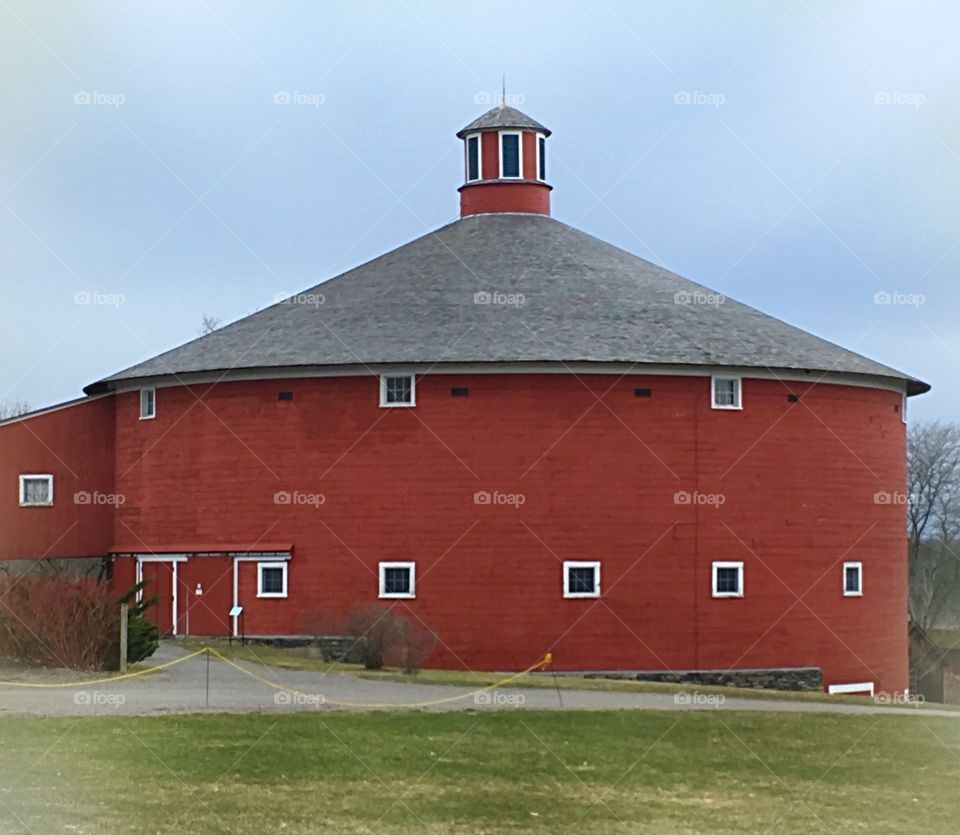 The Round Barn at Shelburne Museum, Shelburne, Vermont, USA.  Historical building salvaged and restored in the grounds of this history museum. 