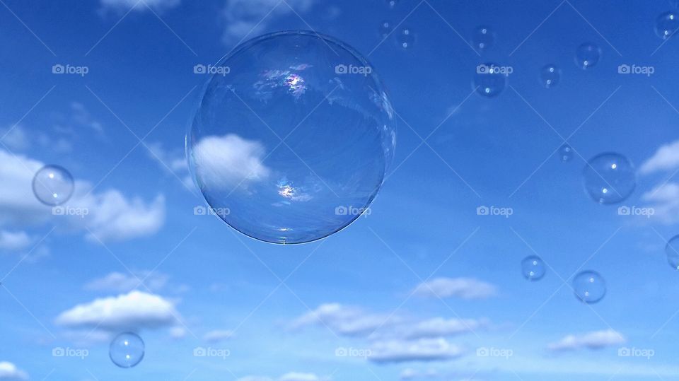 Bubbles in a light sky!. Soap bubbles!