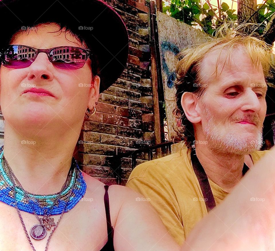 Petra Schiller and Timothy Trespas, partners in life since 2007 for 15 long years are sitting on a stoop in Fort Greene, Bklyn, NY and “dig the urban scenery” together. August 2021. Hypnotic Productions